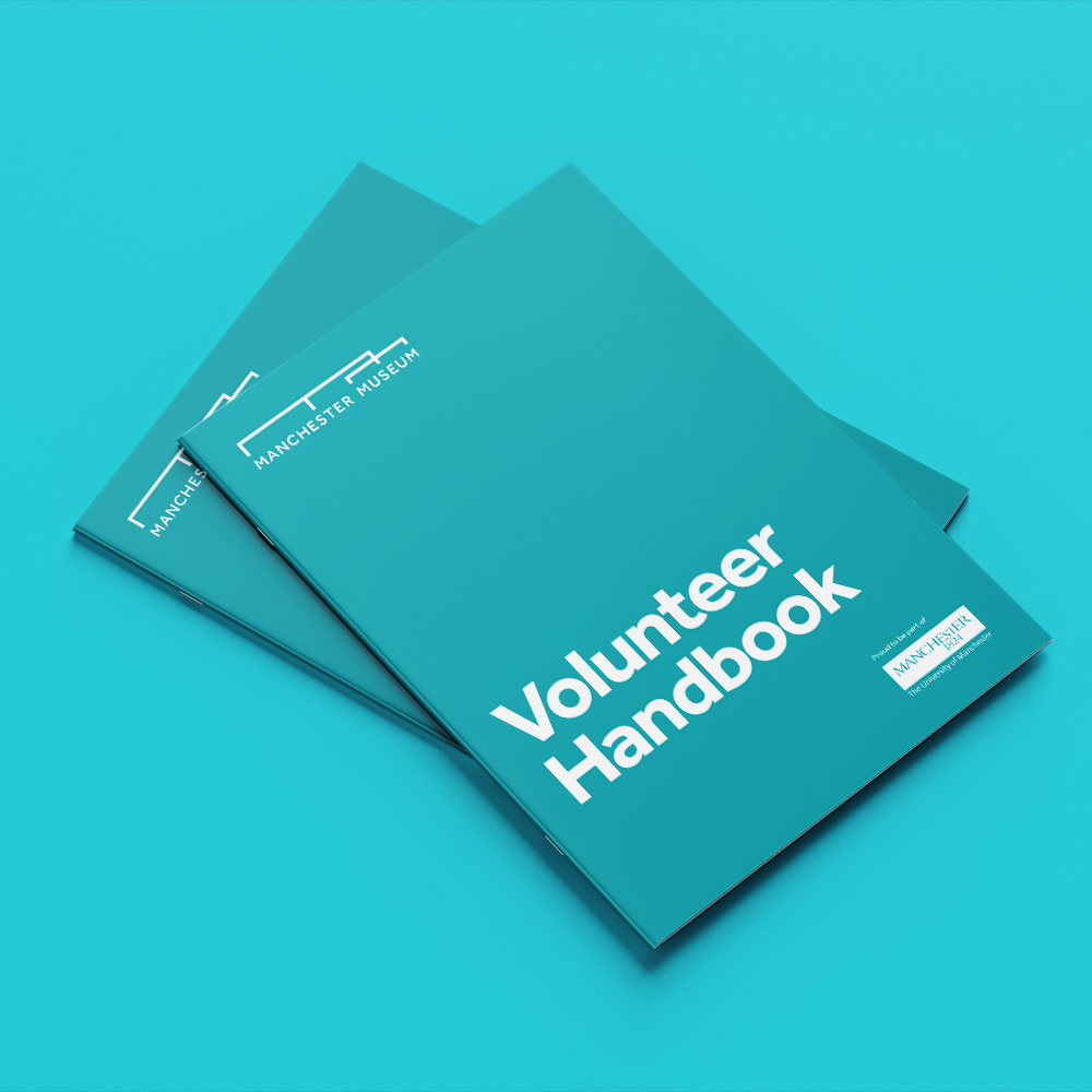 Manchester Museum Volunteer Handbook — stacked teal printed booklets with white logomark and bold typography
